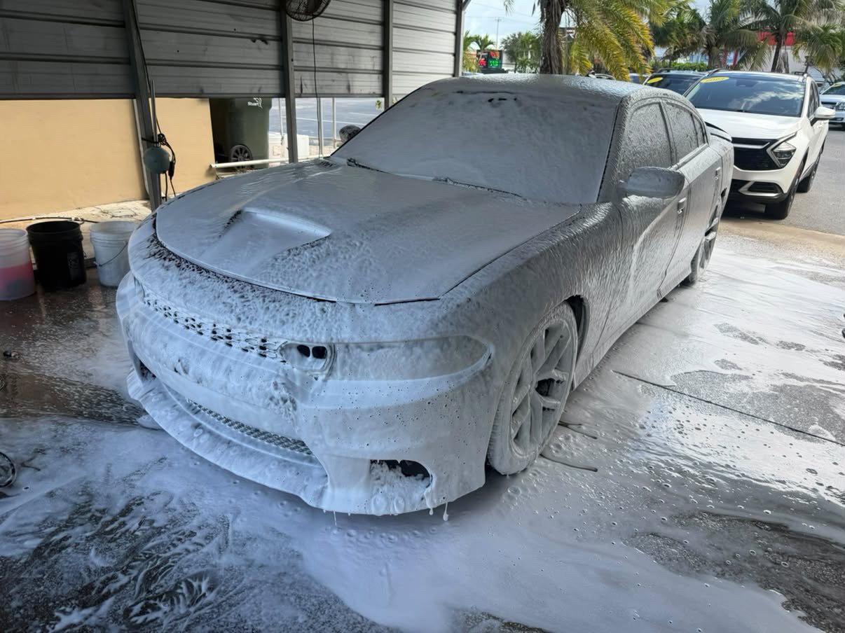 Charger covered in foam during a KARZ hand wash